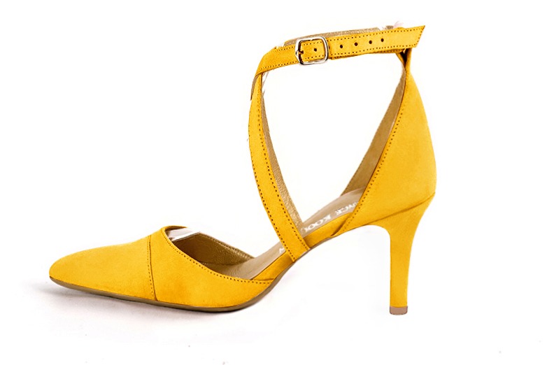 Yellow women's open side shoes, with crossed straps. Tapered toe. High slim heel. Profile view - Florence KOOIJMAN